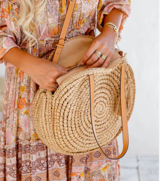 Round bag with long strap