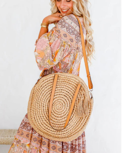 Round bag with long strap