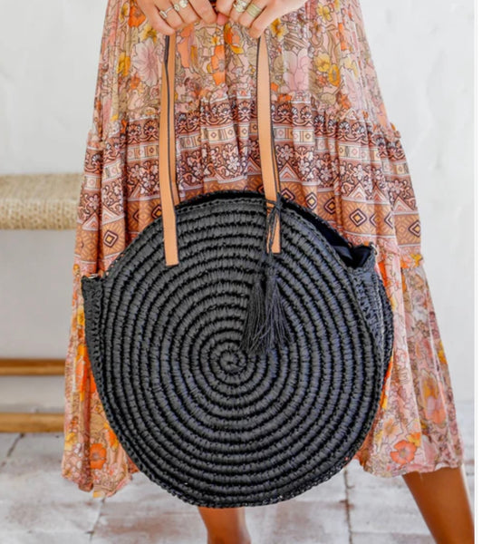 Round bag with long strap
