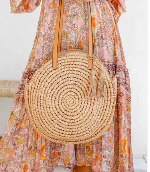 Round bag with long strap