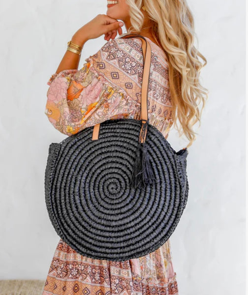 Round bag with long strap